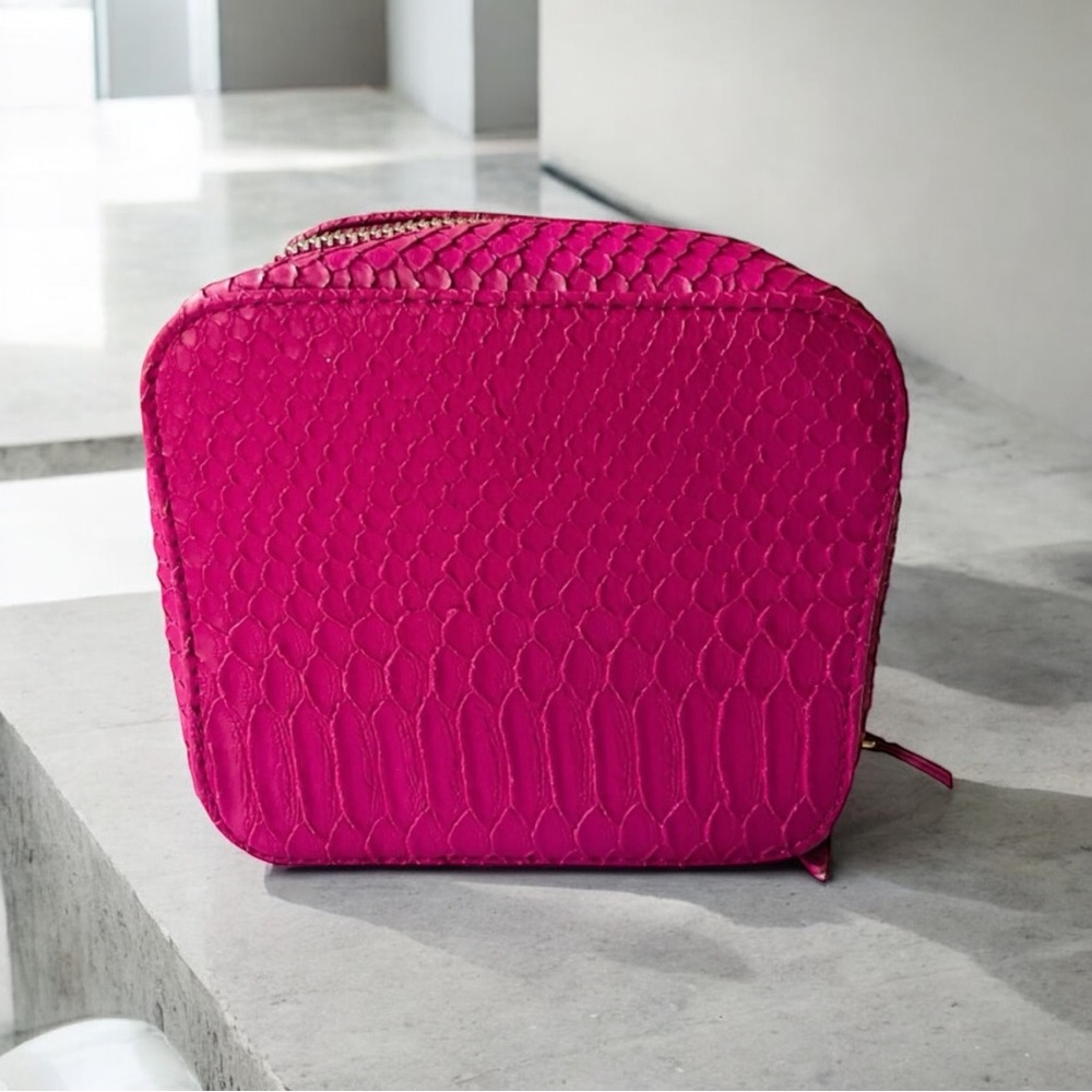 TRISH McEvoy embossed pink makeup planner